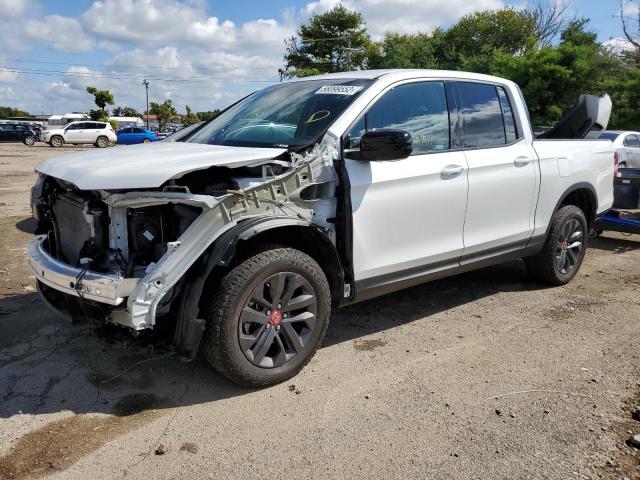 Photo 2 from auction – 2021 HONDA RIDGELINE with VIN 5FPYK3F12MB003060