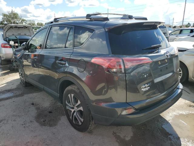 Photo 3 from auction – 2018 TOYOTA RAV4 LE with VIN JTMZFREV4JJ175572