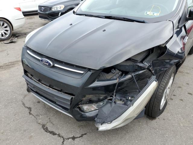 Photo 9 from auction – 2014 FORD ESCAPE SE with VIN 1FMCU9GX4EUB75582