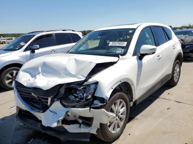 Photo 2 from auction – 2016 MAZDA CX-5 TOURI with VIN JM3KE2CY6G0645244