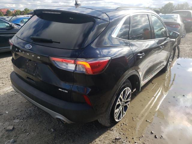 Photo 4 from auction – 2021 FORD ESCAPE SEL with VIN 1FMCU9H68MUB10271