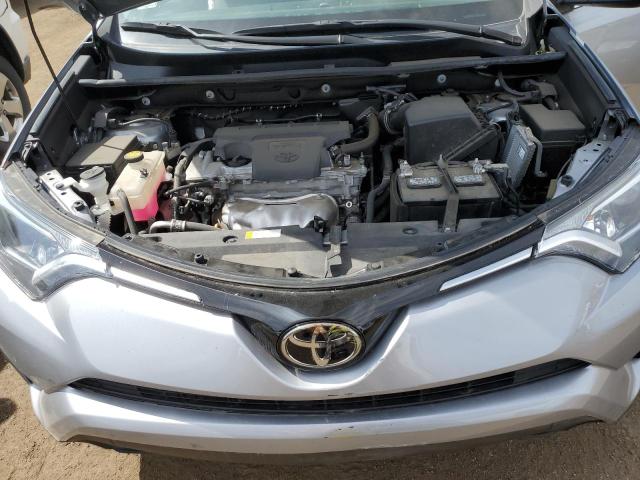 Photo 7 from auction – 2018 TOYOTA RAV4 LE with VIN 2T3ZFREV0JW429344