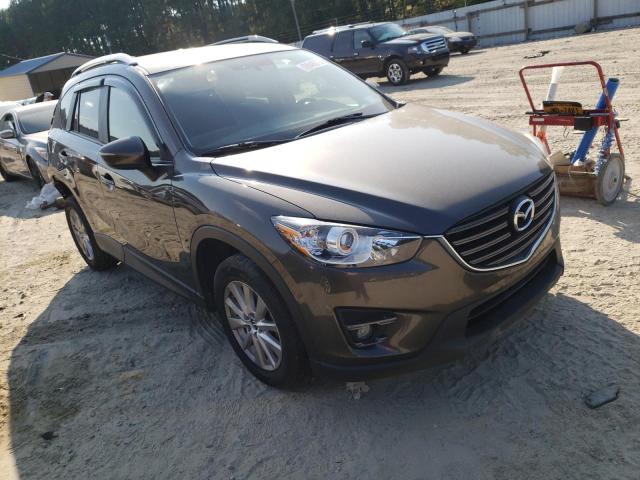 MAZDA CX-5 TOURI 2016 with VIN JM3KE4CY2G0879053 - Photo from auction