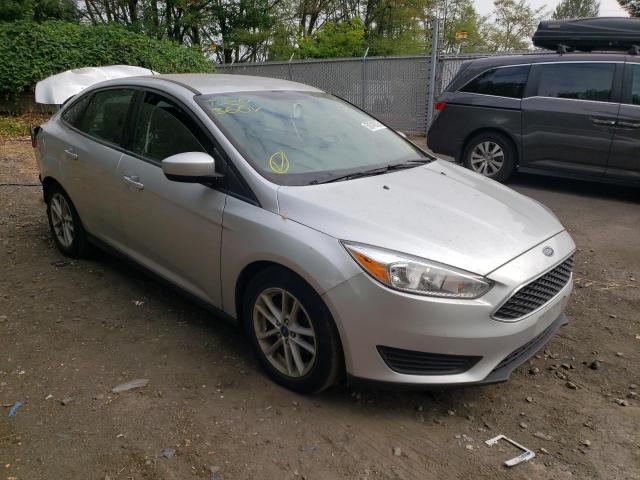 FORD FOCUS SE 2018 with VIN 1FADP3FE4JL205778 - Photo from auction
