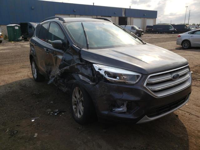 FORD ESCAPE SE 2018 with VIN 1FMCU9GDXJUB23793 - Photo from auction