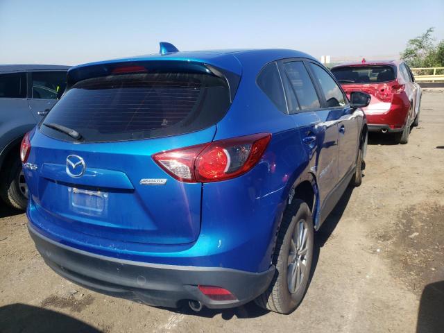 Photo 4 from auction – 2014 MAZDA CX-5 SPORT with VIN JM3KE2BE2E0336794
