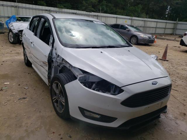 FORD FOCUS SE 2016 with VIN 1FADP3KE8GL239575 - Photo from auction