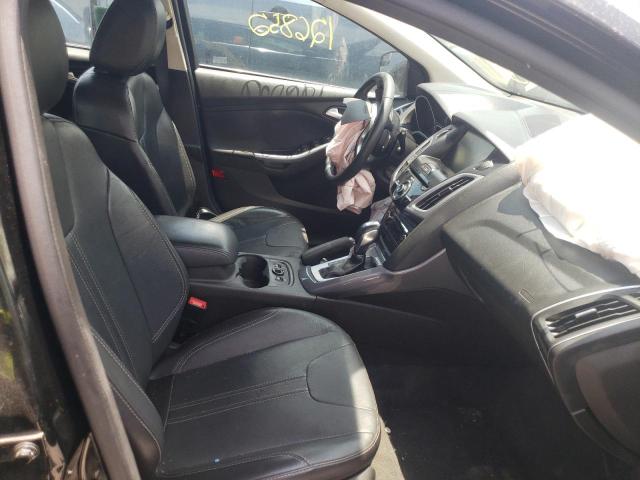 Photo 5 from auction – 2014 FORD FOCUS TITA with VIN 1FADP3N25EL190835