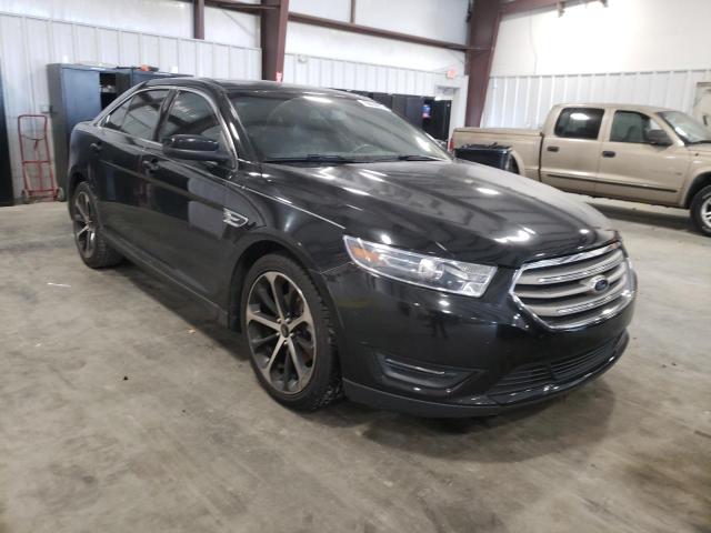 FORD TAURUS SEL 2014 with VIN 1FAHP2E84EG177695 - Photo from auction