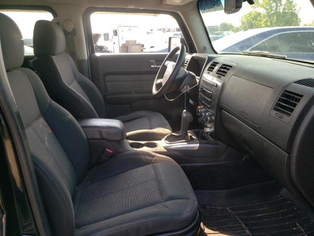 Photo 5 from auction – 2009 HUMMER H3 with VIN 5GTEN13EX98114065