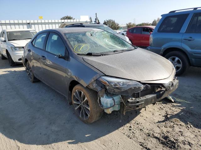 TOYOTA COROLLA L 2019 with VIN 5YFBURHE7KP857149 - Photo from auction