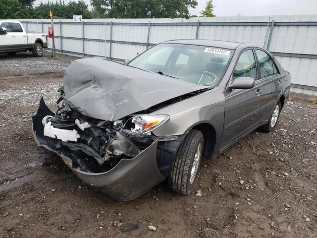 Photo 2 from auction – 2004 TOYOTA CAMRY LE with VIN 4T1BF30K94U586458