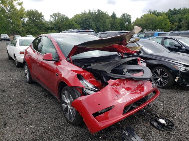 TESLA MODEL Y 2021 with VIN 5YJYGAEEXMF223193 - Photo from auction