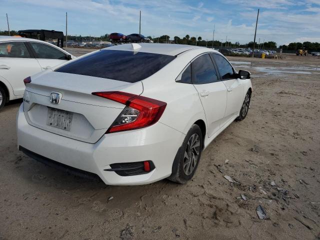 Photo 4 from auction – 2018 HONDA CIVIC EX with VIN 19XFC2F75JE016673