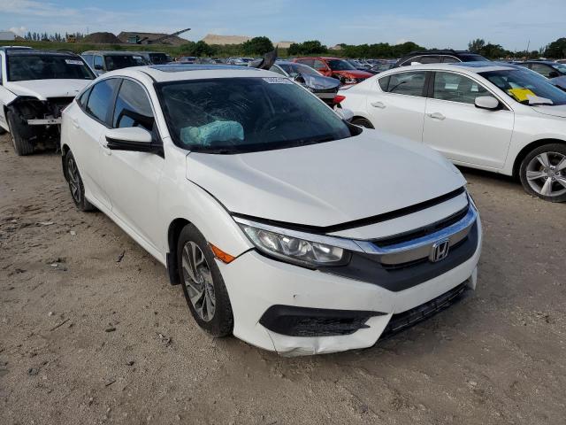HONDA CIVIC EX 2018 with VIN 19XFC2F75JE016673 - Photo from auction