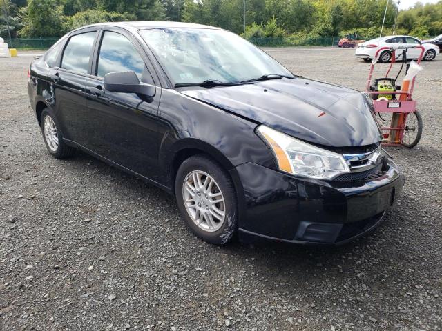 FORD FOCUS SE 2011 with VIN 1FAHP3FN2BW100111 - Photo from auction