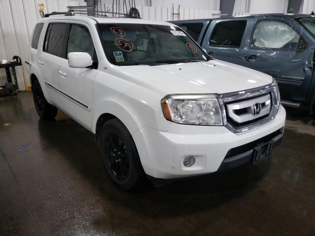 HONDA PILOT TOUR 2010 with VIN 5FNYF4H93AB002517 - Photo from auction