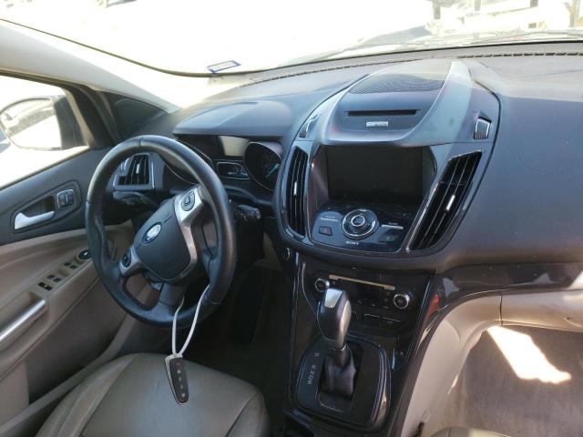 Photo 9 from auction – 2015 FORD ESCAPE TIT with VIN 1FMCU0J93FUA46871
