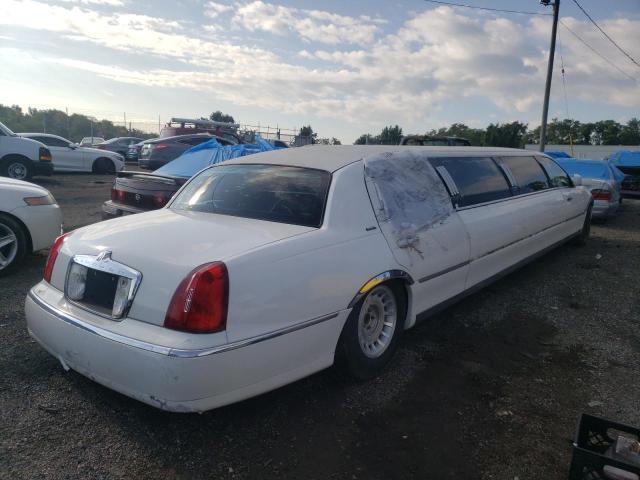 Photo 4 from auction – 2000 LINCOLN TOWN CAR E with VIN 1L1FM81W9YY860344
