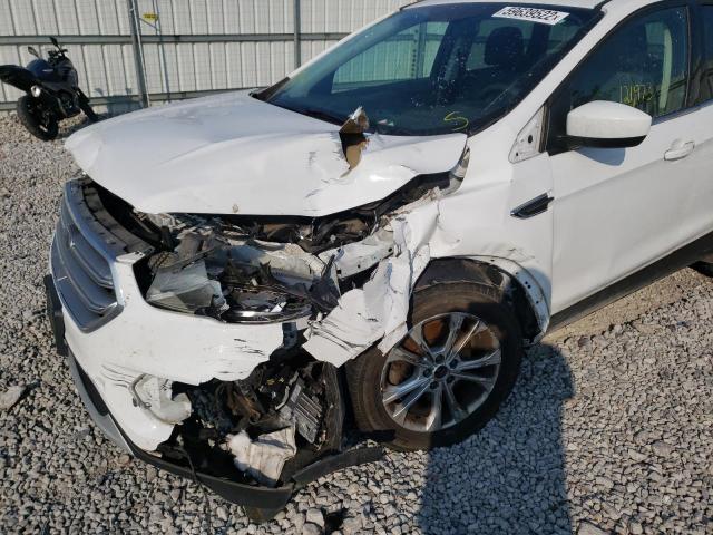 Photo 9 from auction – 2017 FORD ESCAPE SE with VIN 1FMCU9GD7HUD07843