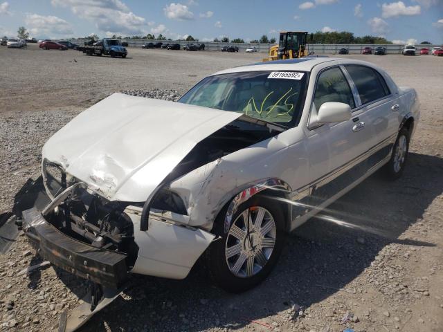 Photo 2 from auction – 2006 LINCOLN TOWN CAR D with VIN 1LNHM83V56Y636447