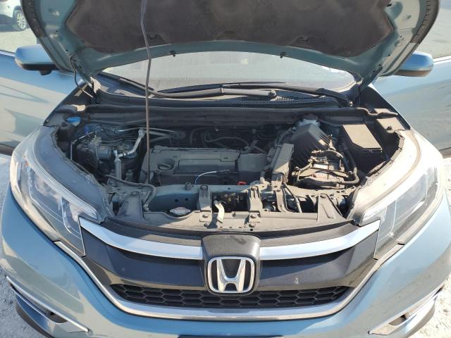 Photo 7 from auction – 2015 HONDA CR-V EX with VIN 2HKRM3H52FH555914
