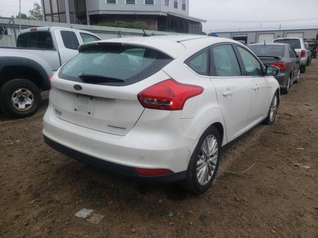 Photo 4 from auction – 2016 FORD FOCUS TITA with VIN 1FADP3N23GL223575