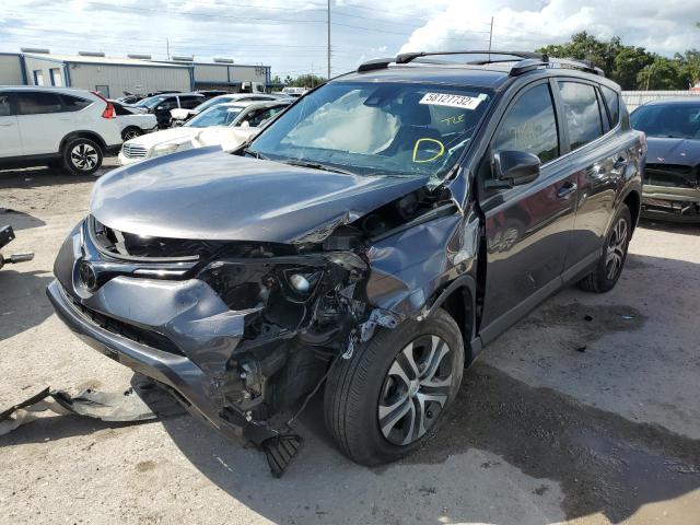 Photo 2 from auction – 2018 TOYOTA RAV4 LE with VIN JTMZFREV4JJ175572