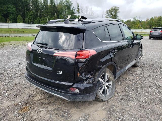 Photo 4 from auction – 2018 TOYOTA RAV4 ADVEN with VIN 2T3RFREV7JW852678