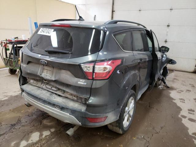 Photo 4 from auction – 2018 FORD ESCAPE SE with VIN 1FMCU9GD5JUA83512