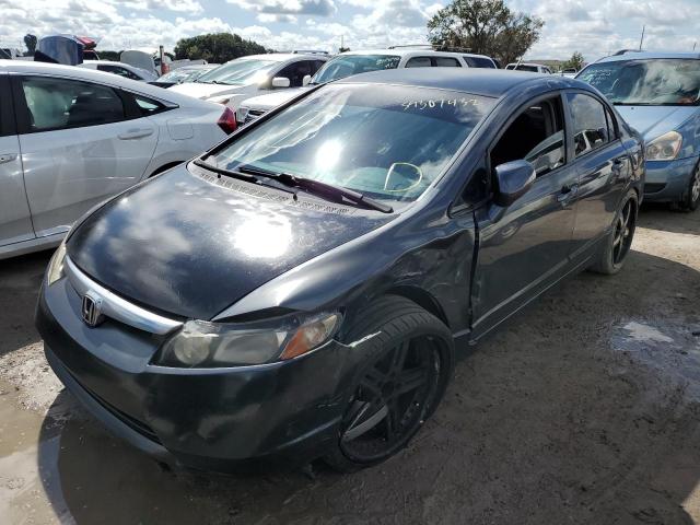 Photo 2 from auction – 2006 HONDA CIVIC HYBR with VIN JHMFA36216S020691