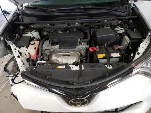 Photo 7 from auction – 2018 TOYOTA RAV4 LE with VIN JTMZFREV6JJ747077