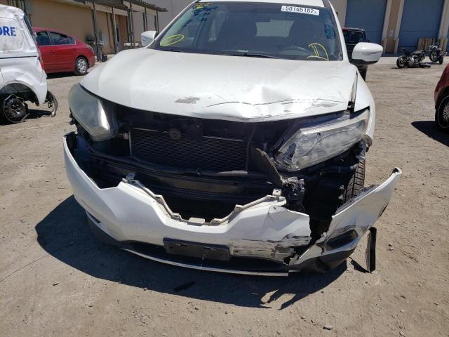 Photo 9 from auction – 2015 NISSAN ROGUE S with VIN 5N1AT2MT2FC839436