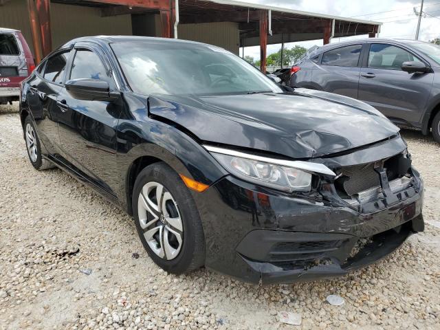HONDA CIVIC LX 2018 with VIN 19XFC2F59JE024399 - Photo from auction