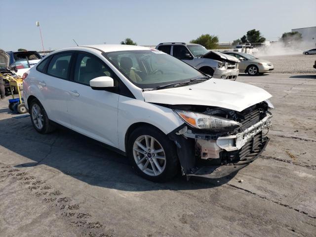 FORD FOCUS SE 2018 with VIN 1FADP3F21JL277950 - Photo from auction