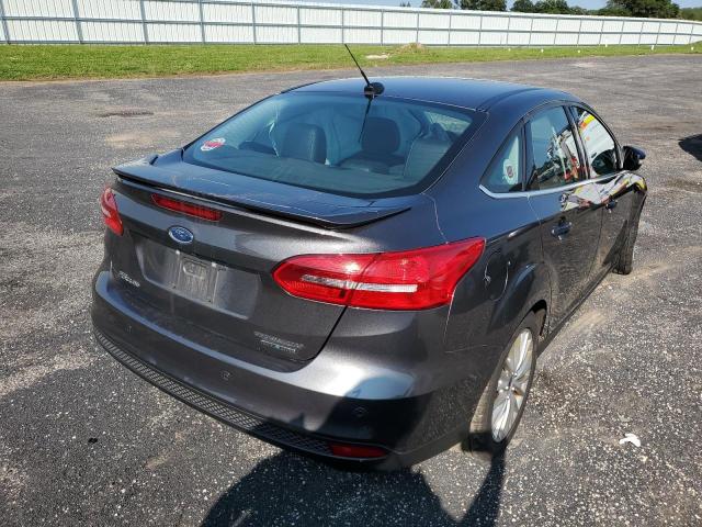 Photo 4 from auction – 2015 FORD FOCUS TITA with VIN 1FADP3J20FL247465