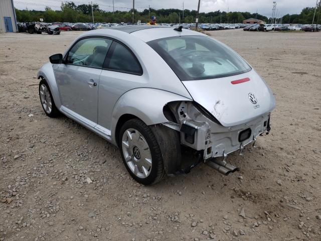 Photo 3 from auction – 2013 VOLKSWAGEN BEETLE with VIN 3VWJP7AT9DM674990