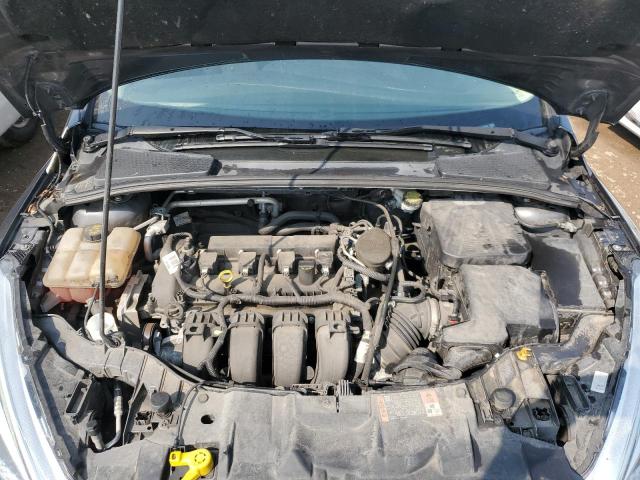 Photo 7 from auction – 2015 FORD FOCUS SE with VIN 1FADP3F28FL325614