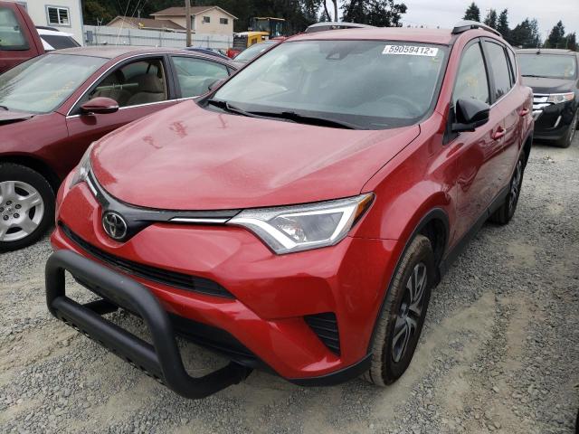 Photo 2 from auction – 2017 TOYOTA RAV4 LE with VIN JTMBFREVXHJ129840