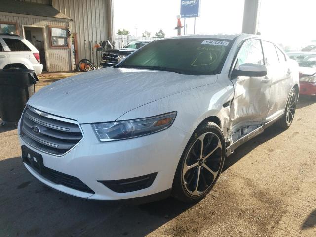 Photo 2 from auction – 2014 FORD TAURUS SEL with VIN 1FAHP2E80EG110088