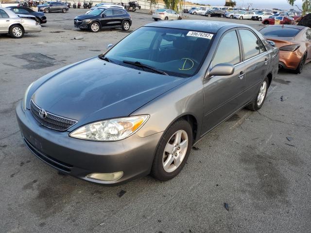 Photo 2 from auction – 2003 TOYOTA CAMRY LE with VIN JTDBE32K730161590