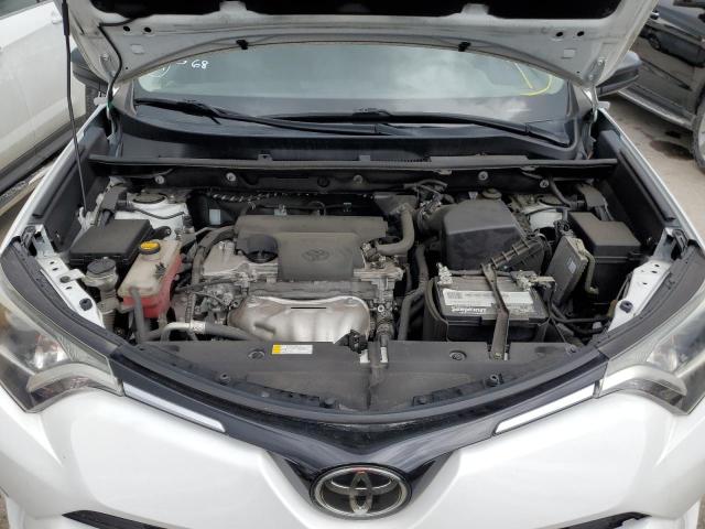 Photo 7 from auction – 2018 TOYOTA RAV4 LE with VIN 2T3ZFREVXJW433675