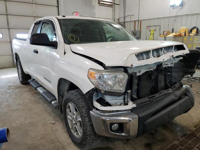 TOYOTA TUNDRA DOU 2014 with VIN 5TFUM5F17EX054445 - Photo from auction