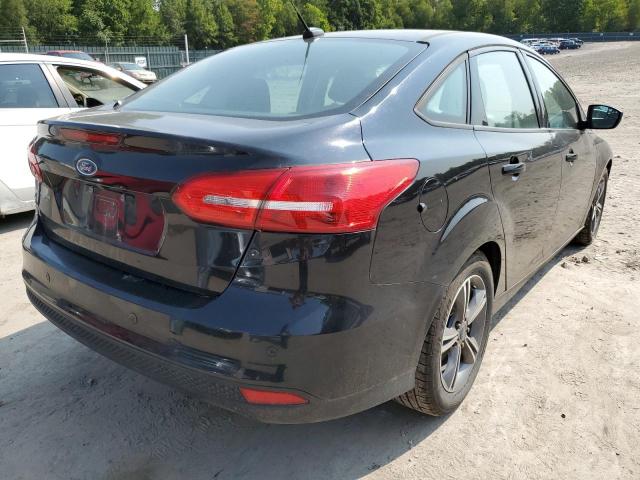 Photo 4 from auction – 2016 FORD FOCUS SE with VIN 1FADP3FE3GL302320