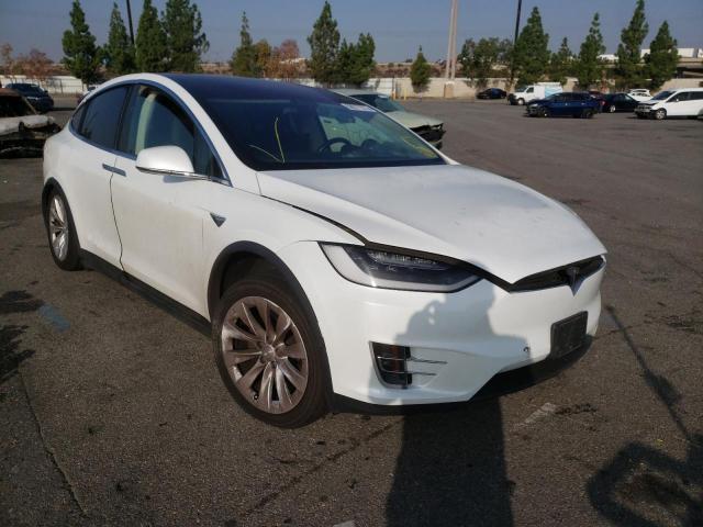 TESLA MODEL X 2018 with VIN 5YJXCDE28JF122356 - Photo from auction
