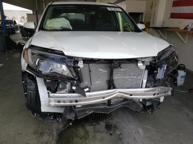 Photo 9 from auction – 2022 HONDA PILOT SE with VIN 5FNYF6H20NB055227