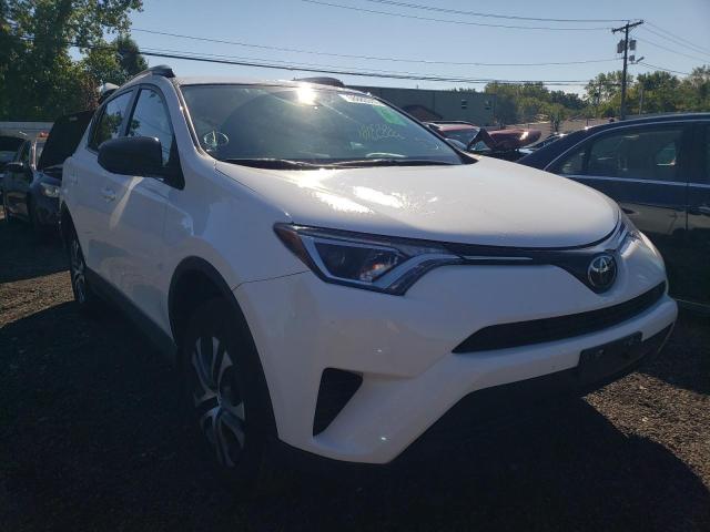TOYOTA RAV4 LE 2018 with VIN 2T3BFREV4JW748943 - Photo from auction