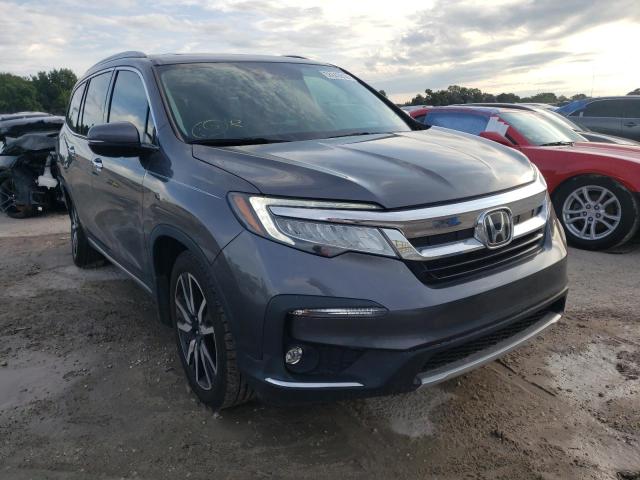 HONDA PILOT ELIT 2019 with VIN 5FNYF6H00KB080588 - Photo from auction