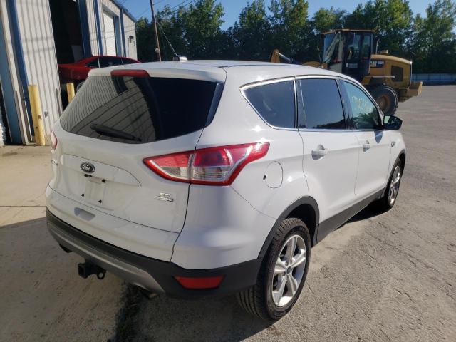 Photo 4 from auction – 2016 FORD ESCAPE SE with VIN 1FMCU9G97GUC13469