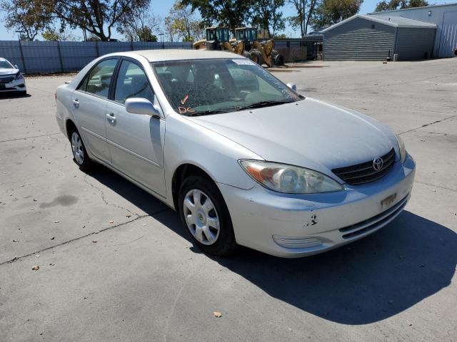 TOYOTA CAMRY LE 2002 with VIN 4T1BE32K92U570029 - Photo from auction